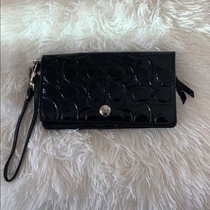 Coach patent leather wallet.